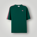 NDO Clothing adidas Originals Oversized T-Shirt in Collegiate Green mit rosa Streifen und Trefoil-Logo