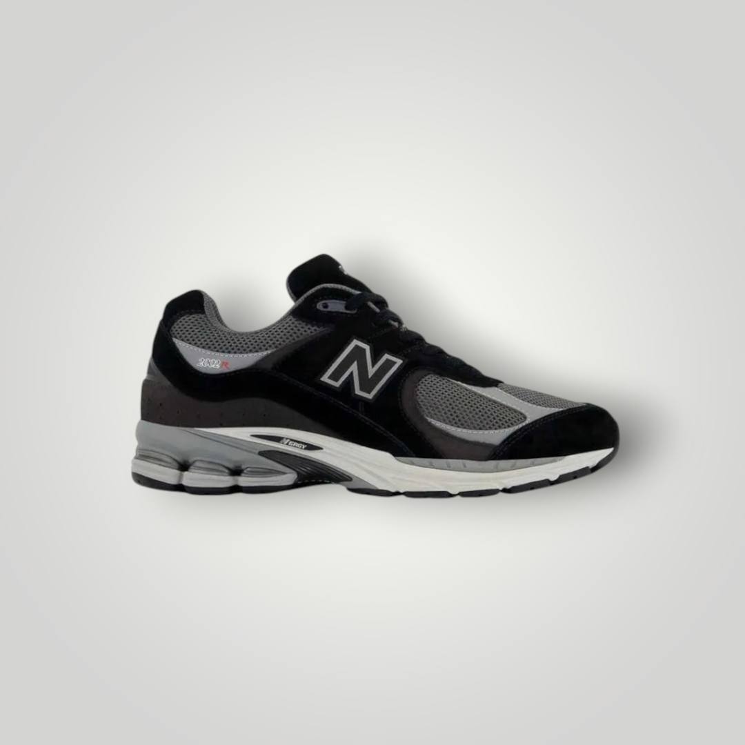 NDO Clothing New Balance 2002 Sneaker in Schwarz und Grau aus Leder und Mesh mit Schnürung und gepolsterter Sohle