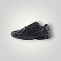 NDO Clothing New Balance 1906R Sneaker in komplettem Schwarz mit Mesh-Obermaterial und profilierter Sohle