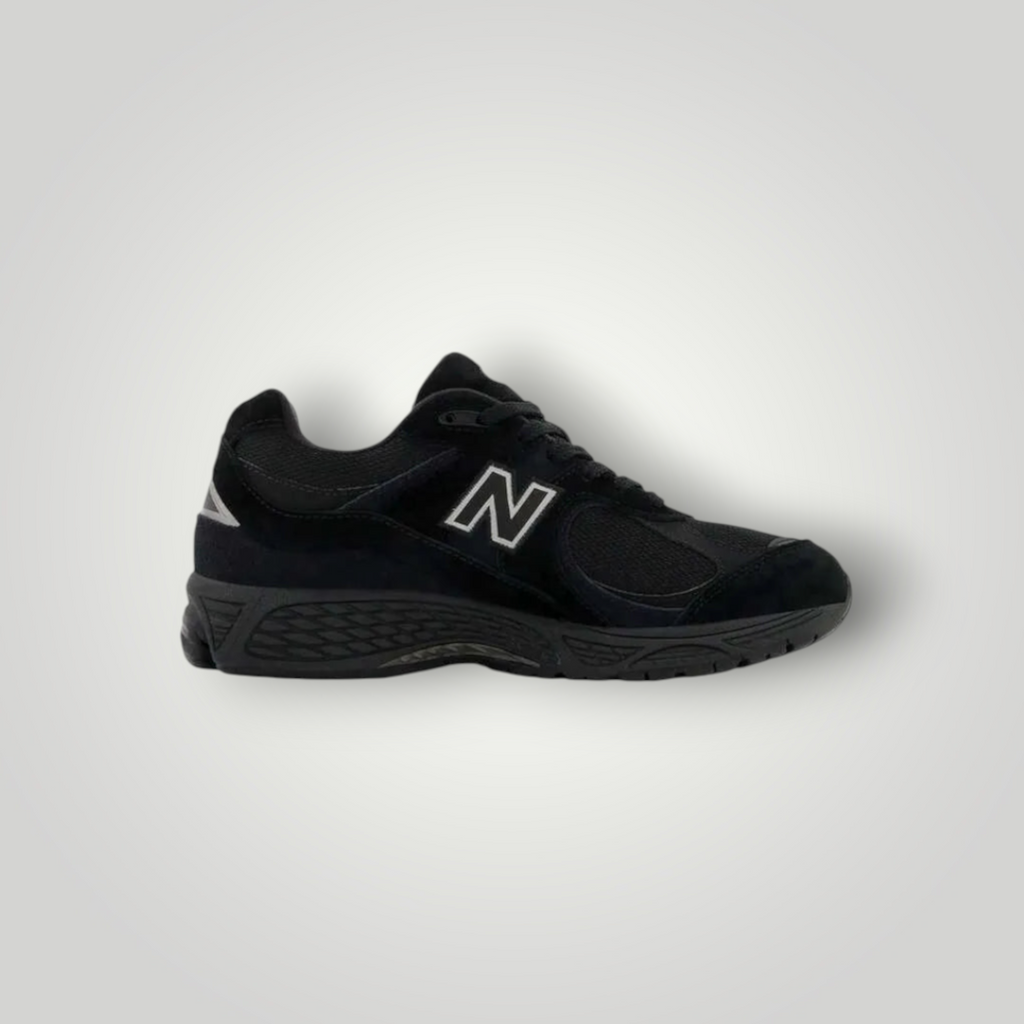 NDO Clothing New Balance 2002 Sneaker in Schwarz aus Leder und Mesh mit Schnürung und gepolsterter Sohle