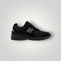 NDO Clothing New Balance 2002 Sneaker in Schwarz aus Leder und Mesh mit Schnürung und gepolsterter Sohle