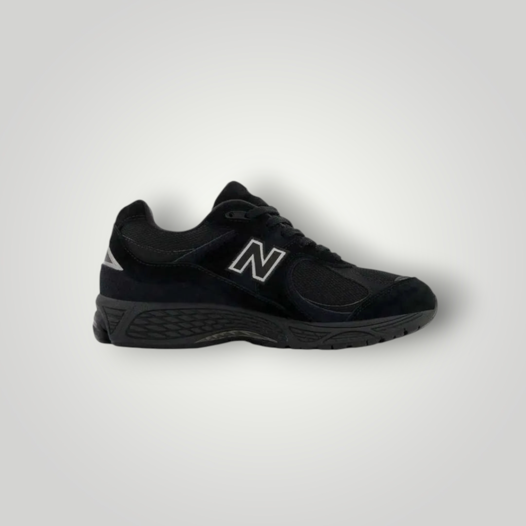NDO Clothing New Balance 2002 Sneaker in Schwarz aus Leder und Mesh mit Schnürung und gepolsterter Sohle