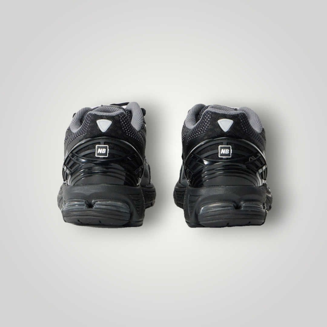 NDO Clothing New Balance U1906 Unisex Sneaker in Schwarz mit Mesh-Obermaterial und strukturierter Fersenkappe