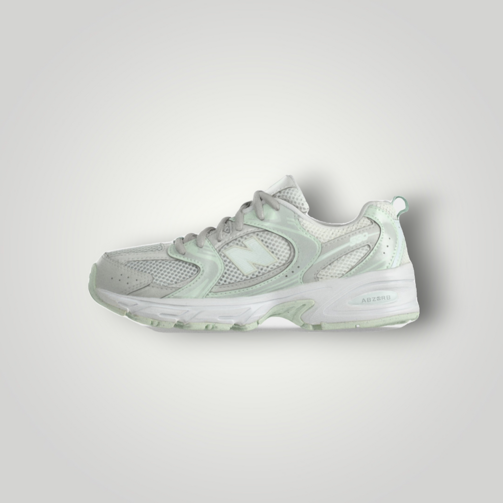 NDO Clothing New Balance 530 Sneaker in Grau und Mintgrün aus Mesh und Kunstleder mit Abzorb-Dämpfung