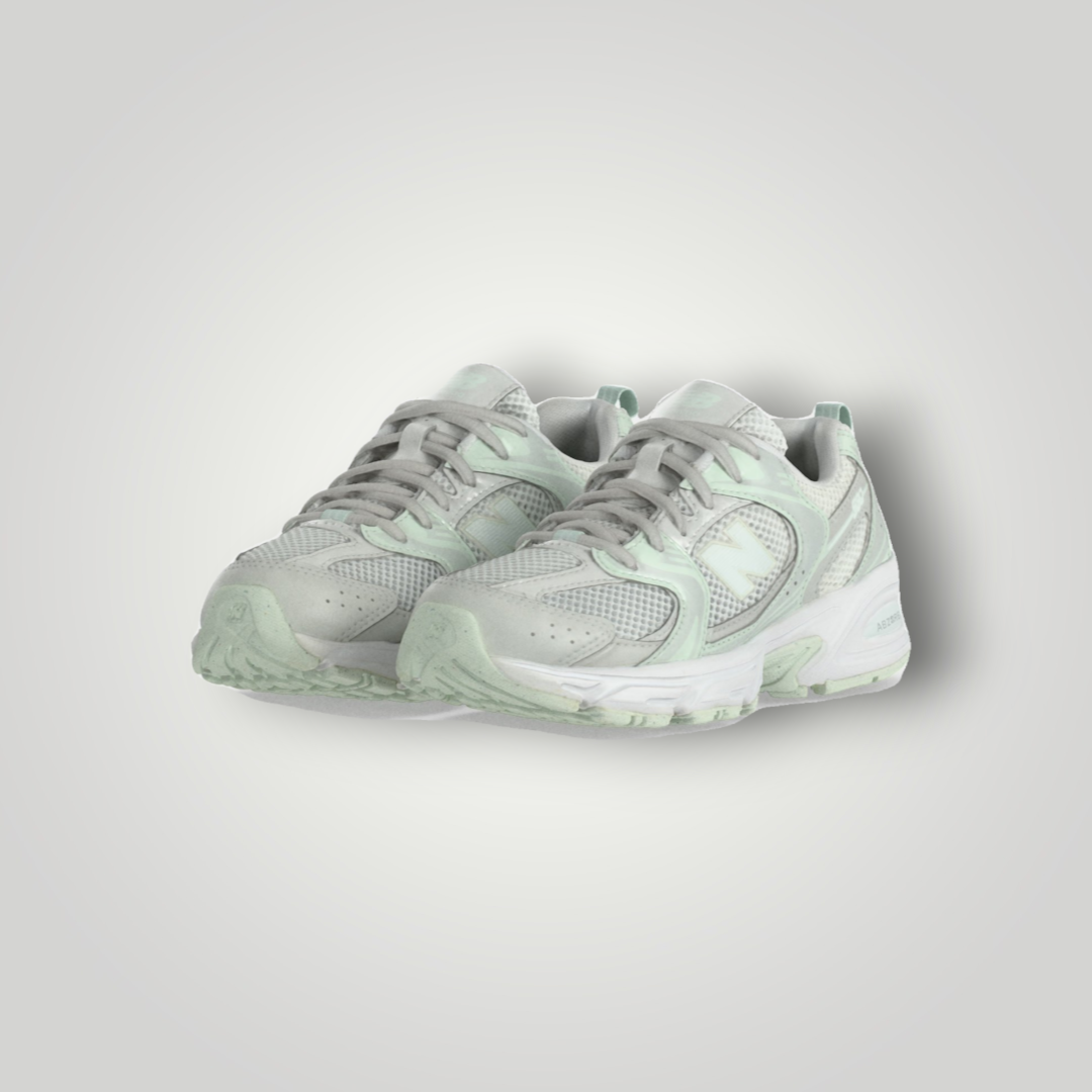 NDO Clothing New Balance 530 Sneaker in Grau und Mintgrün aus Mesh und Kunstleder mit Abzorb-Dämpfung