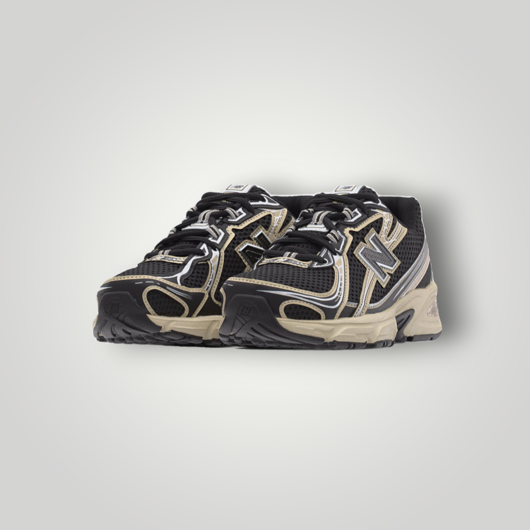 NDO Clothing New Balance 740 Unisex Sneaker in Schwarz mit Mesh-Obermaterial und beigen Akzenten