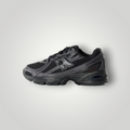 NDO Clothing New Balance 740 Unisex Sneaker in Schwarz aus Kunstleder und Mesh mit Schnürung und flacher Sohle