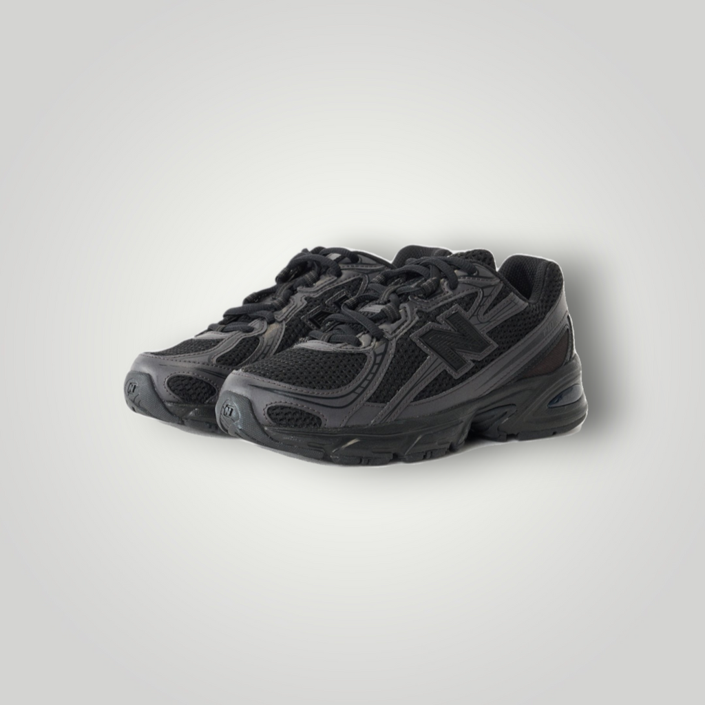 NDO Clothing New Balance 740 Unisex Sneaker in Schwarz aus Mesh und Kunstleder mit Schnürung und flacher Sohle