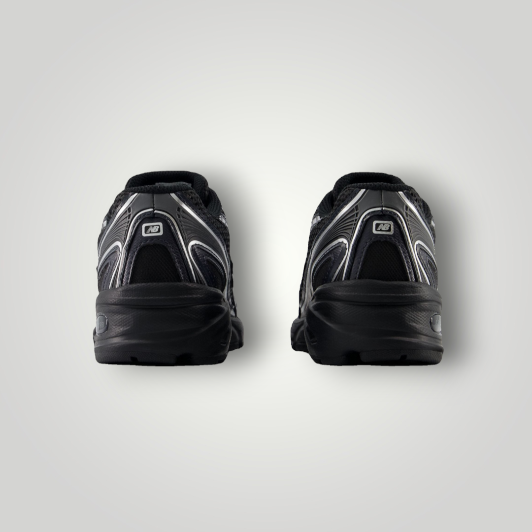 Rückansicht der schwarzen New Balance 740 Unisex Sneaker aus Leder und Mesh mit Schnürung von NDO Clothing