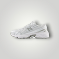 NDO Clothing New Balance 740 Unisex Sneaker in Weiß mit Mesh-Obermaterial und Schnürung in Seitenansicht