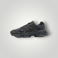 NDO Clothing New Balance 9060 Unisex Sneaker in Schwarz aus Leder und Mesh mit markanter Sohle