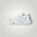 NDO Clothing New Balance 9060 Unisex Sneaker in Weiß aus Leder und Mesh mit markanter Chunky-Sohle in Seitenansicht
