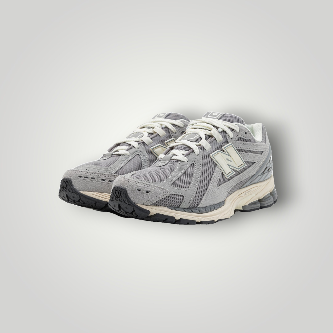 NDO Clothing New Balance M1906REJ Sneaker in Grau aus Leder und Mesh mit Schnürung und N-ERGY Dämpfung