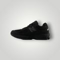 NDO Clothing New Balance 2002 Sneaker in Schwarz aus Leder und Mesh mit Schnürung und flacher Sohle