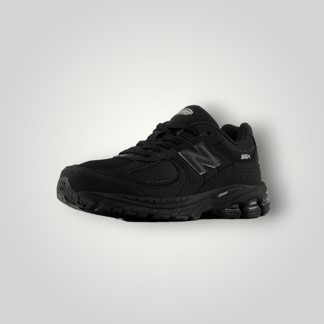 NDO Clothing New Balance 2002 Sneaker in Schwarz aus Leder und Mesh mit Schnürung und robuster Laufsohle