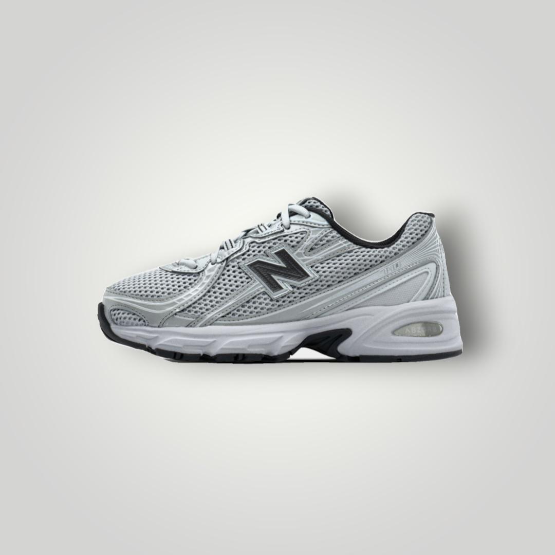 NDO Clothing New Balance U740 Sneaker in Weiss mit Mesh-Obermaterial und charakteristischem N-Logo in Seitenansicht