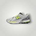 NDO Clothing New Balance U1906 Sneaker in hellem Silber-Metallic mit leuchtend grünen Akzenten und Mesh-Obermaterial