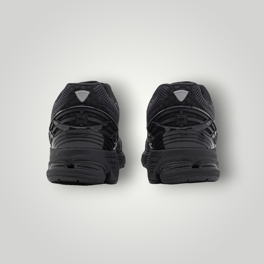 NDO Clothing New Balance U1906 Unisex Sneaker in Schwarz mit Mesh-Obermaterial und robuster Gummisohle, Rückansicht