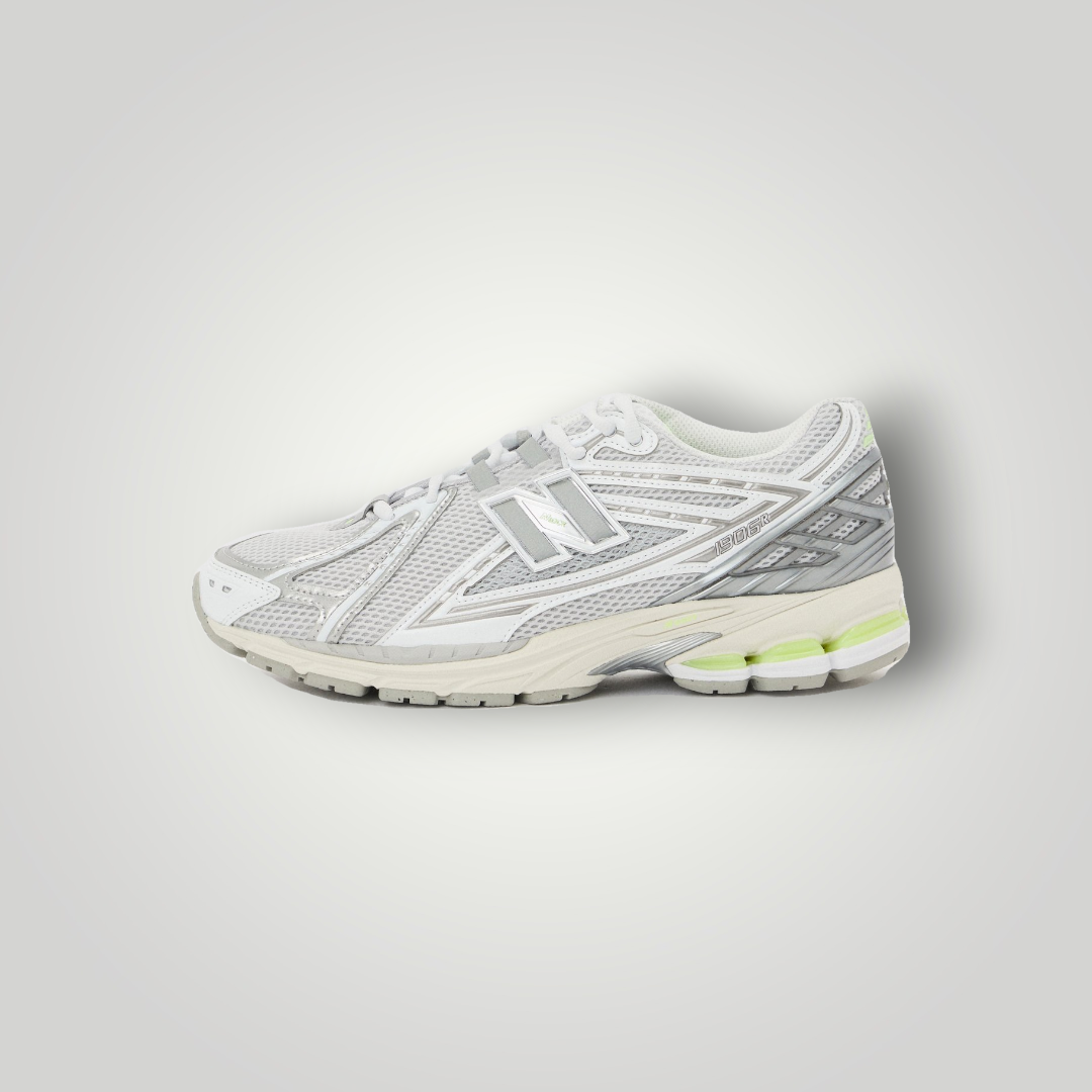 NDO Clothing New Balance U1906 Sneaker in Grau mit Mesh-Obermaterial und gelben Akzenten in der Sohle