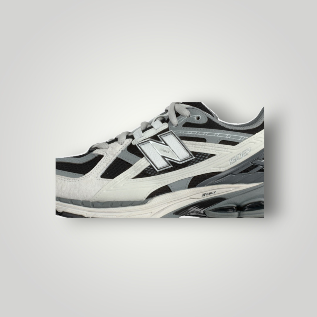 NDO Clothing New Balance U1906 Sneaker in Taupe und Schwarz mit Mesh-Obermaterial und N-ERGY Sohlentechnologie