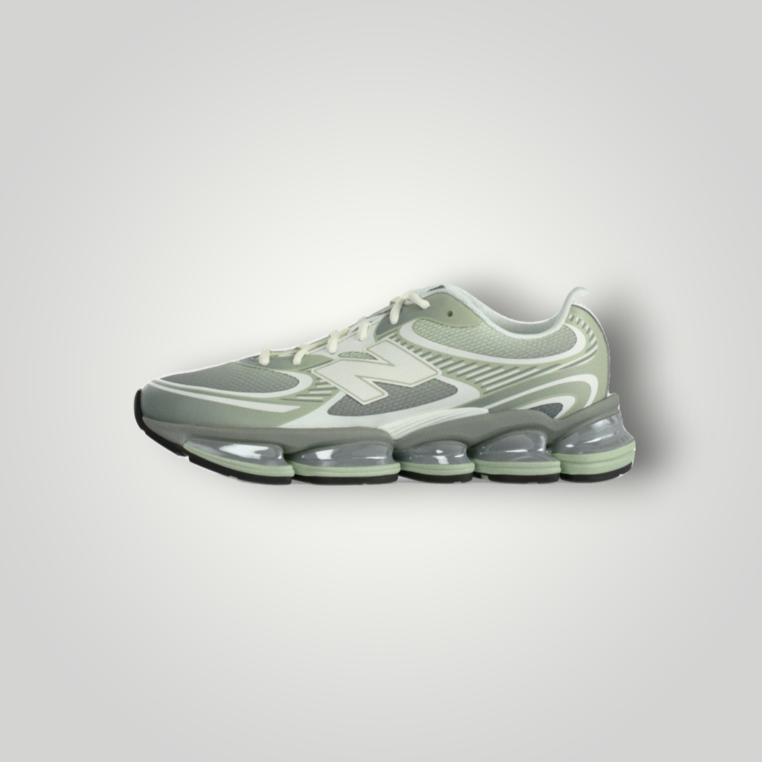 NDO Clothing New Balance U2000 Sneaker in Silber und Moosgrün mit Mesh-Obermaterial und markanter Dämpfungssohle