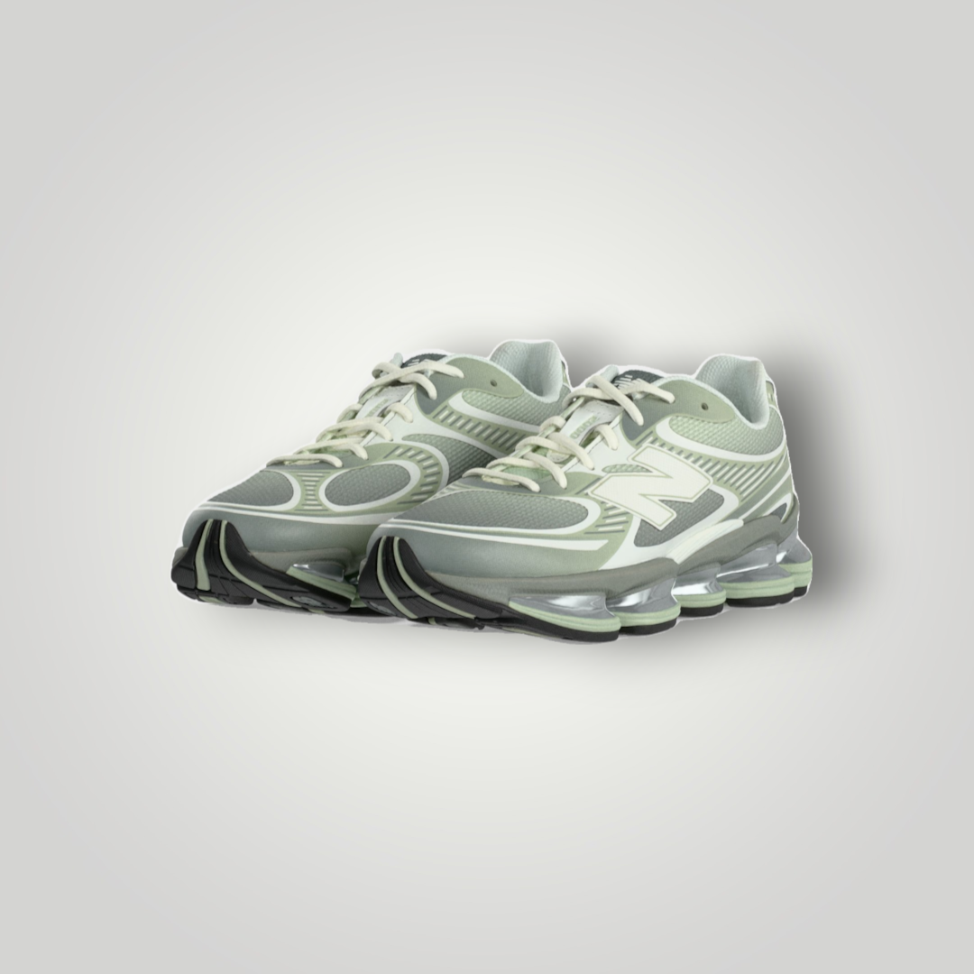 NDO Clothing New Balance U2000 Sneaker in Silber-Moosgrün mit Mesh-Obermaterial und markanter Dämpfungssohle