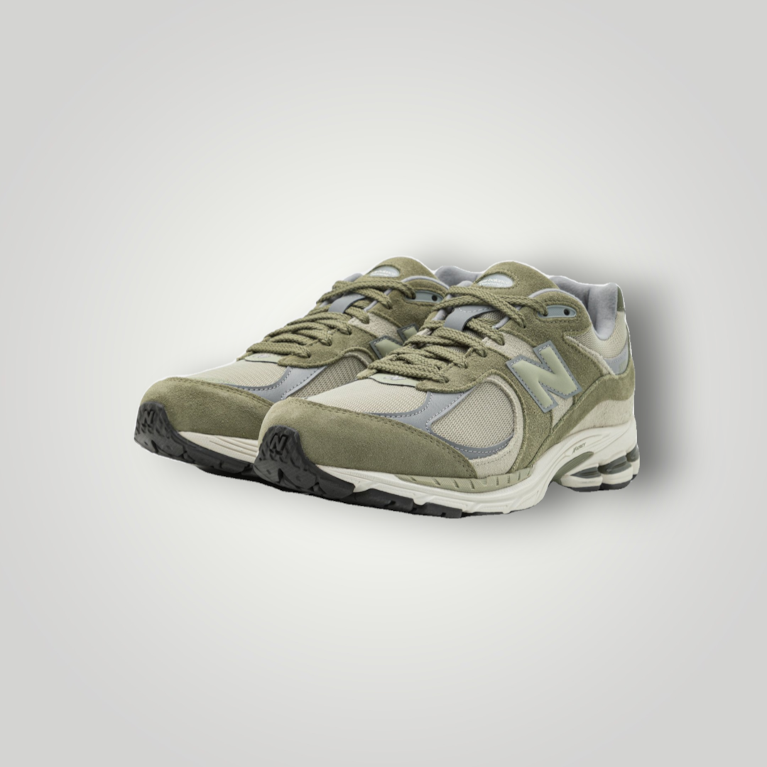 NDO Clothing New Balance U2002 Sneaker in Dunkeloliv aus Leder und Mesh mit Schnürung und robuster Außensohle