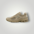 NDO Clothing New Balance U2002 Sneaker in Stoneware mit Wildleder- und Mesh-Details sowie silbernen Akzenten