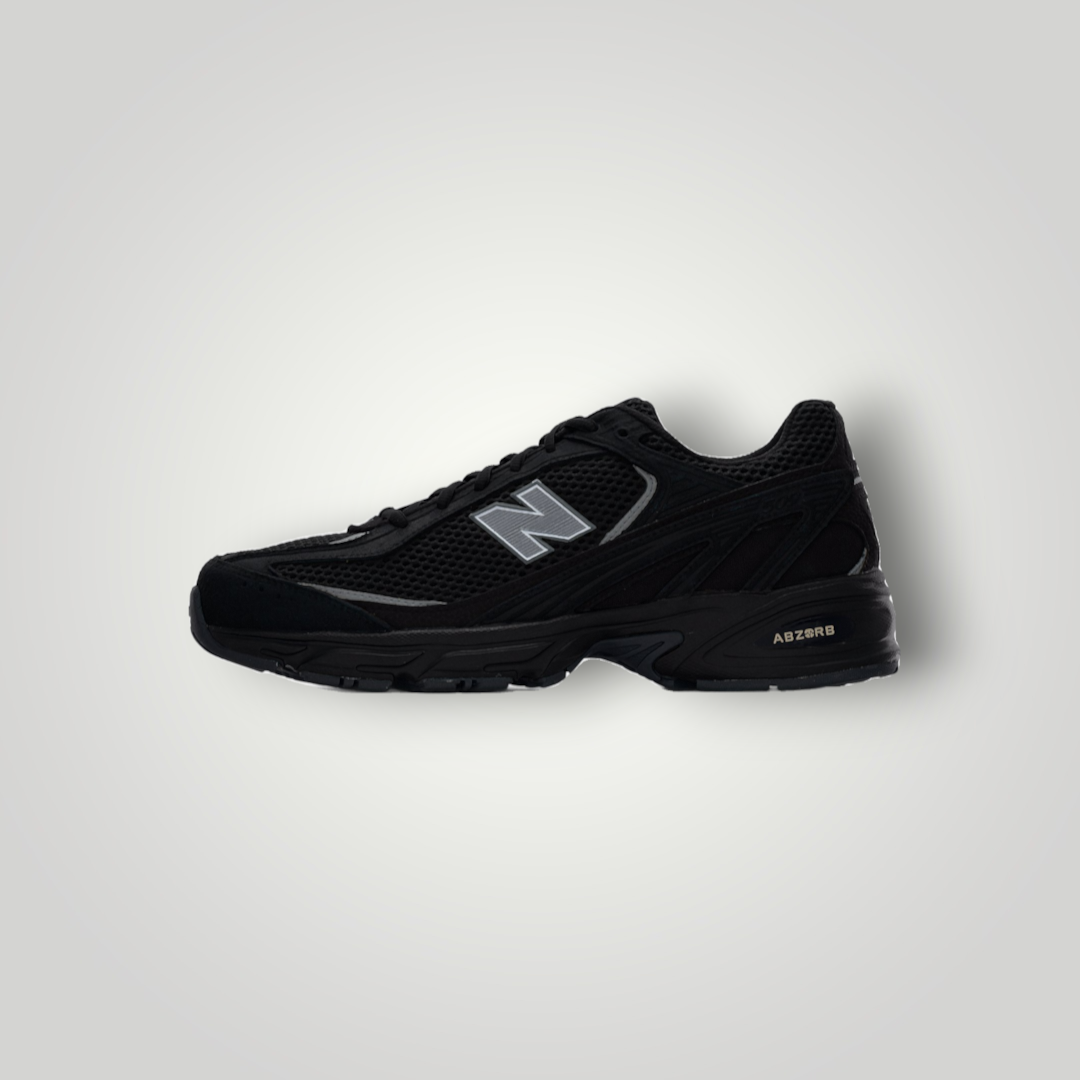 NDO Clothing New Balance U509 Unisex Sneaker in Schwarz aus Mesh und Leder mit reflektierenden Details und Abzorb-Sohle