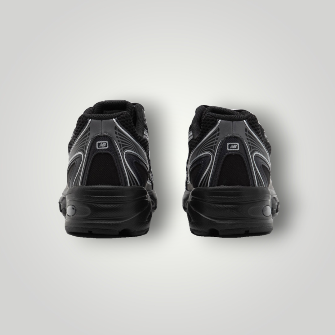 NDO Clothing New Balance U740 Unisex Sneaker in Schwarz aus Mesh und Kunstleder, Rückansicht mit reflektierenden Details