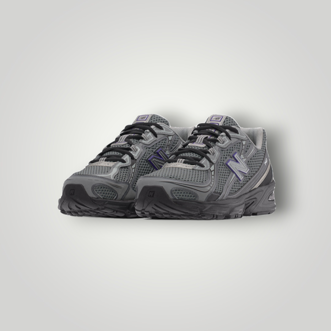 NDO Clothing New Balance U740 Unisex Sneaker in Schwarz, Grau und Blau aus atmungsaktivem Mesh mit Schnürung.