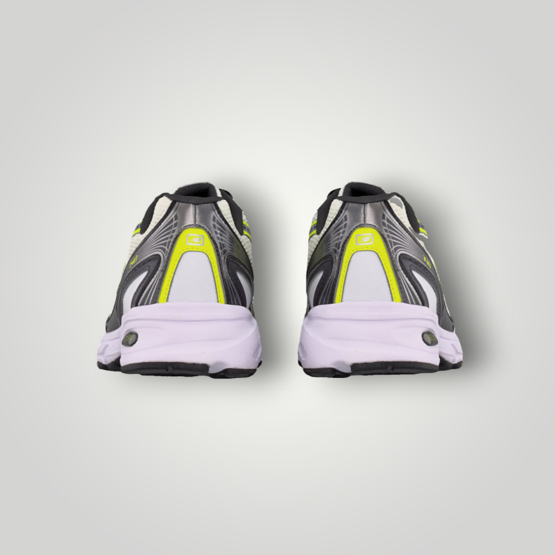 NDO Clothing New Balance U740 Sneaker in Weiss und Grün, Rückansicht mit Mesh-Obermaterial und Abzorb-Dämpfung