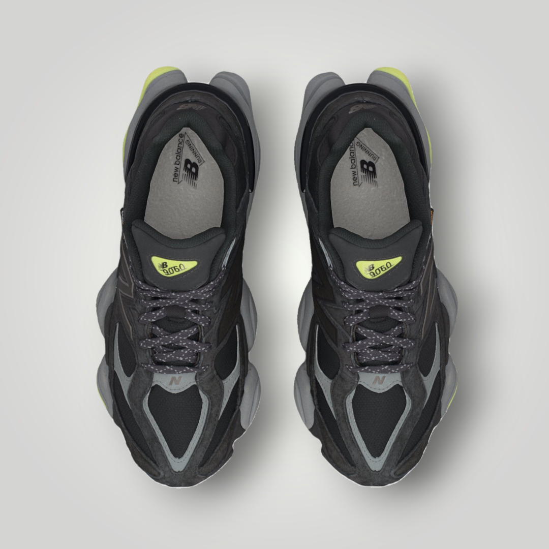 NDO Clothing New Balance U9060 Sneaker in Schwarz und Grau mit neongelben Akzenten, Mesh- und Rauleder-Obermaterial.
