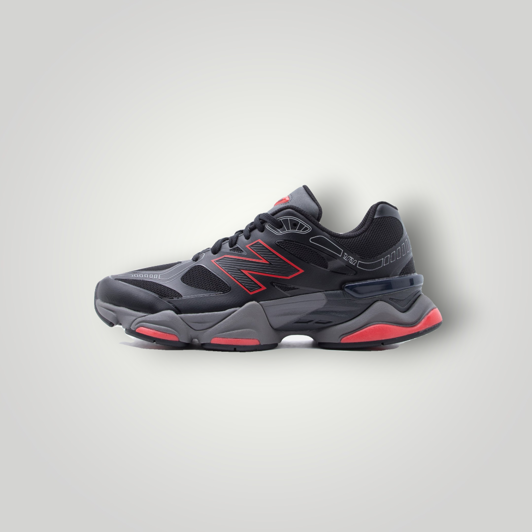 NDO Clothing New Balance U9060 Sneaker in Schwarz mit roten Akzenten, Mesh-Obermaterial und robuster Sohle.
