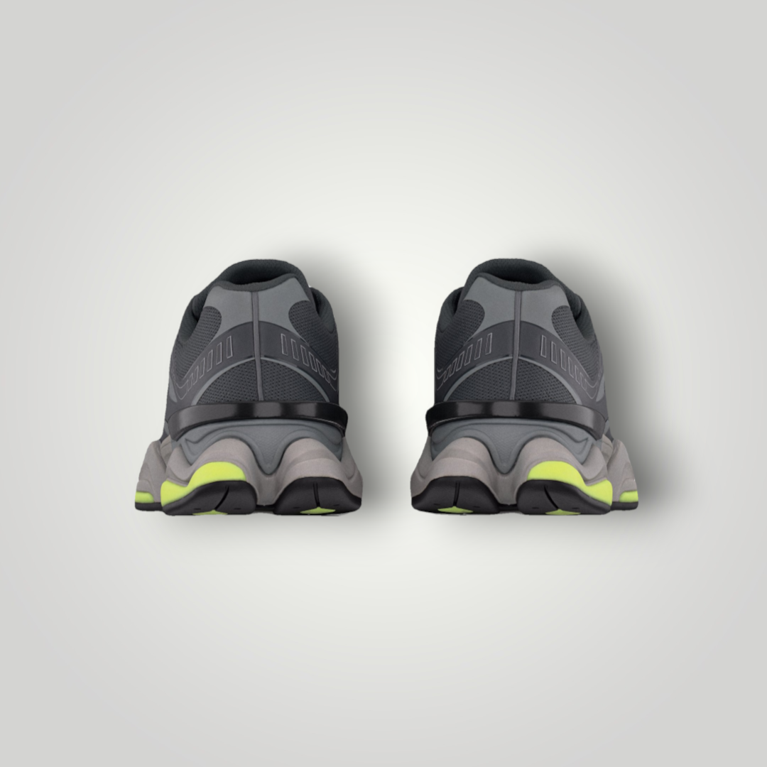 NDO Clothing New Balance U9060 Sneaker in Grau mit gelben Akzenten, Rückansicht der sportlichen Mesh-Schuhe
