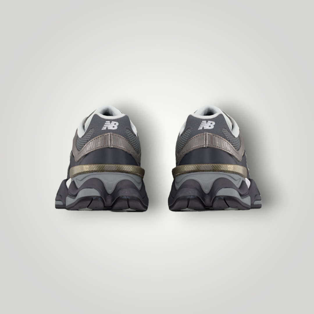 NDO Clothing New Balance U9060 Sneaker in Magnet und Faded Black, Rückansicht mit markanter Sohle und Logo-Detail.