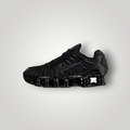 NDO Clothing Nike Shox TL Sneaker in Schwarz mit markanter 4-Säulen-Dämpfung und reflektierenden Details