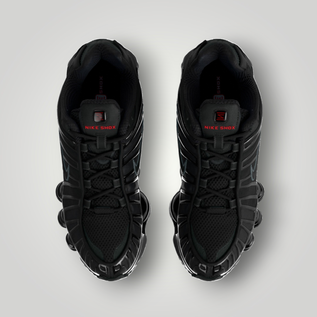 NDO Clothing Nike Shox TL Sneaker in Schwarz mit markanter 4-Säulen-Dämpfung und Schnürung in der Draufsicht