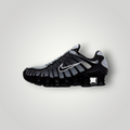 NDO Clothing Nike Shox TL Sneaker in Schwarz und Grau mit Mesh-Obermaterial und markanter mechanischer Dämpfung