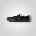 NDO Clothing Vans Classic Slip-On in Schwarz aus Textil mit flacher Sohle und seitlichem Elastikeinsatz