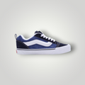 NDO Clothing Vans KNU SKOOL Skateschuh in Navy und Weiß aus Leder und Canvas mit markanter Seitenlinie